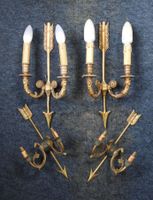 DEUX PAIRES D'APPLIQUES à deux bras de lumière en bronze cis…
