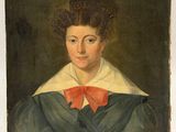 portrait of a woman in a green dress with a red bow