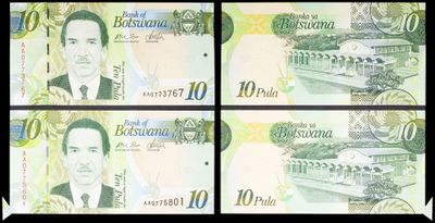quatre billets de banque de différentes devises sont représentés sur un fond noir