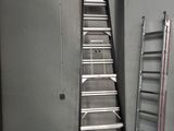 a ladder that is leaning against a wall in a room