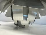 a close up of a metal object on a table