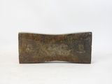 an image of a rusty metal object on a white surface