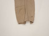 an image of a pair of tan pants hanging on a wall