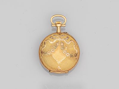 an image of a gold pocket watch with a chain on a white surface