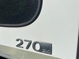 a white truck with a number on the side of it