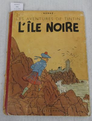 french children ' s book, l ' ile noire, with a picture of a man in a kilt
