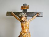 a statue of jesus on the cross with a cross on it