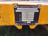 a close up of a sign on the back of a tractor