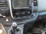 a dashboard of a car with a clock on it