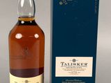 a bottle of taliskr single malt whisky next to a box