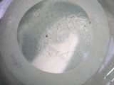 a close up of a toilet bowl with the lid down