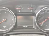 a close up of a car dashboard with a speedometer