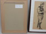 two framed drawings of a man in a uniform and a woman in a hat