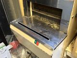 a machine that is sitting on the floor in a room