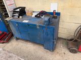 an image of a blue metal work bench in a garage
