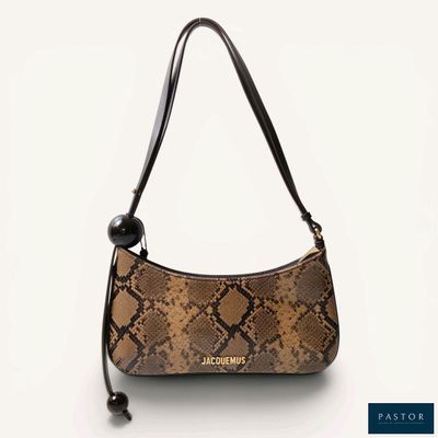 a brown snake skin purse with a black handle and a black strap
