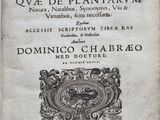 a close up of an old book with writing on it