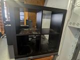 an image of a kitchen with a stove and a microwave