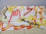 a scarf that has a bunch of different types of scissors on it
