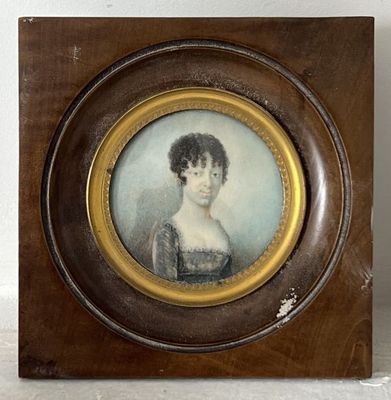 a picture of a woman in a dress in a picture frame