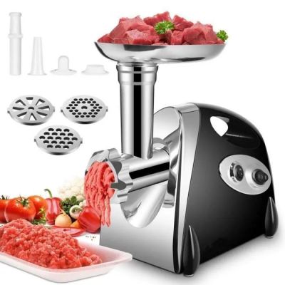 an image of a meat grinder with meat and vegetables on it