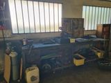 a garage with a lot of tools and a window