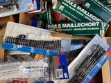 a box full of train tracks and other train accessories