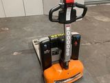 a picture of a forklift sitting in a warehouse