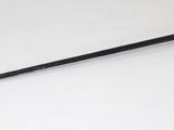 a sword that is on a white surface with a black handle