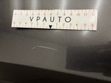 a sticker on the back of a car that says vauto