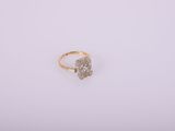 an image of a gold ring with diamonds on a white background