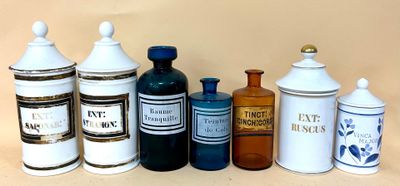 many different types of jars and containers on the table
