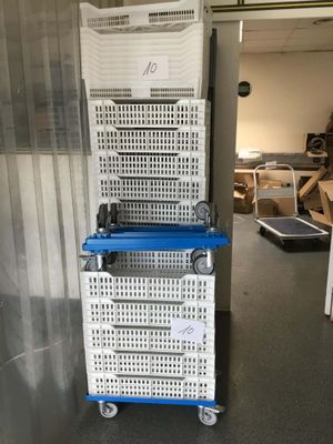 a stack of baskets sitting on top of each other in a room