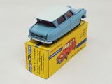 a blue toy car sitting on top of a yellow box