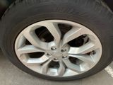 a close up of a tire on a car ' s rim
