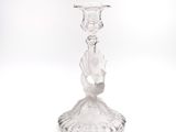 a clear glass candle holder on a white background