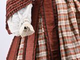 an image of a woman ' s dress with a red and white checkered pattern