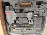 a picture of a stapler and stapler in a tool case