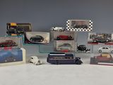 a lot of toy cars that are sitting on a table