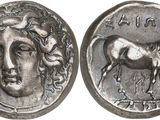 a close up of a coin with a horse on it
