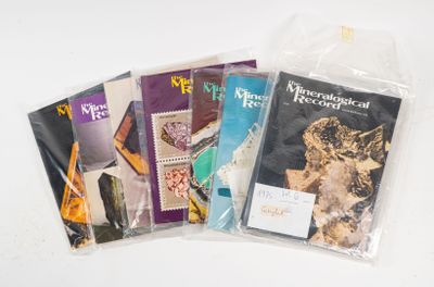 four books in the bag on the table