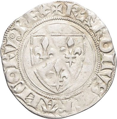 a close up of a coin on a white background