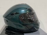 a helmet on display on a stand on a white surface