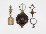an assortment of various items including a key ring, a bottle opener, and a key chain