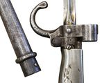 a close up of a knife with a metal handle