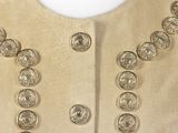 a close up of a jacket with buttons on it