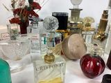 many different types of perfume bottles on a table
