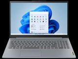 l'ordinateur portable est ouvert sur un fond noir avec un fond bleu