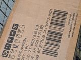 a box that is sitting in a shopping cart