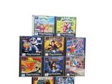a pile of video games on a white background